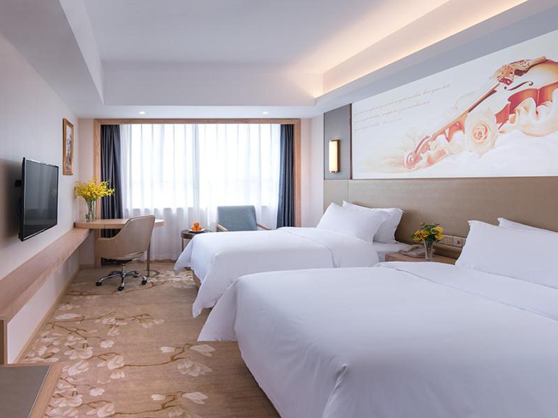 Vienna Hotel Shenzhen Pingji Ave Екстериор снимка